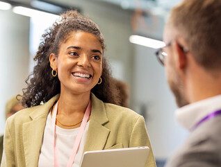 People talking at a conference
