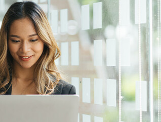 Person holding laptop