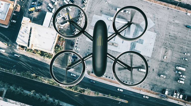 Drone hoovers over city in high angle view