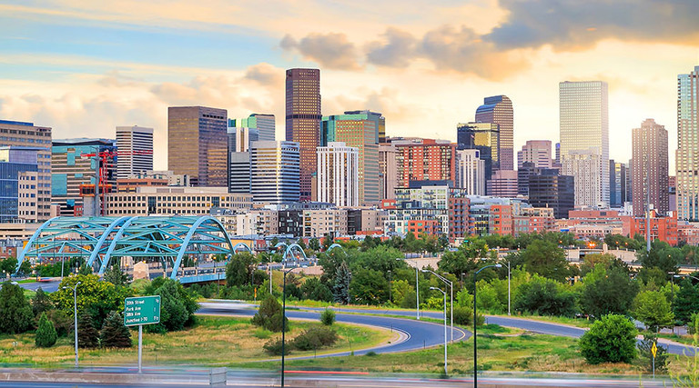 Panorama of Denver skyline long exposure at twilight.