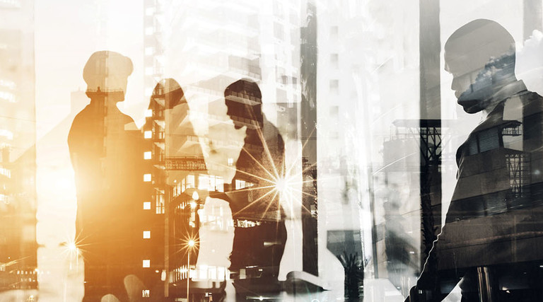 Digitally enhanced shot of a colleagues working in their office