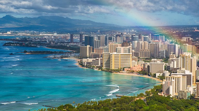 View of Honolulu harbor with a rainbow