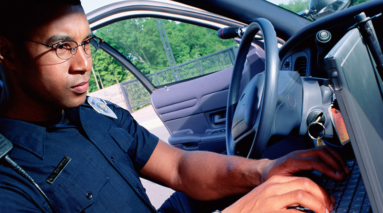 Police officer in car