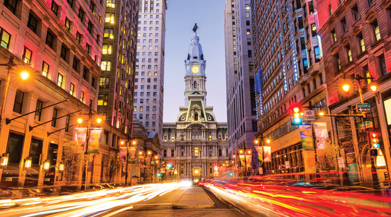 Philadelphia city hall and surrounding streets with streetlights 