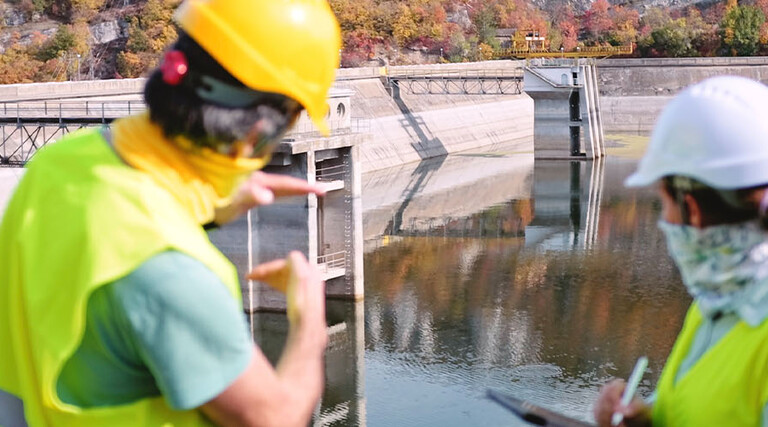 Maintenance engineers working in hydroelectric power station