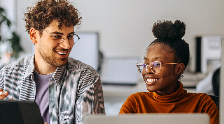 People working in the office together