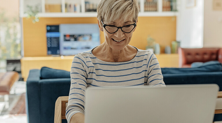 Person using the computer at home