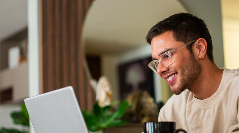 Citizen using laptop in home