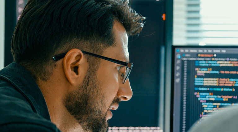 Person looking at code/data
