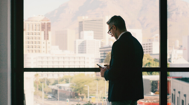 Person using phone in office