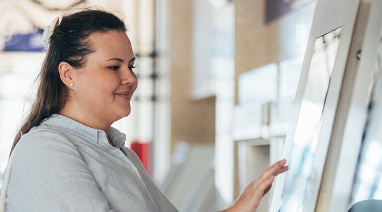 Person using interactive screen