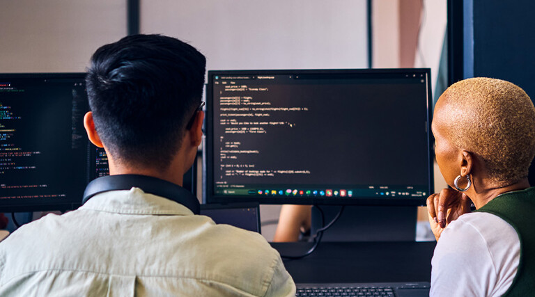 People coding in the office