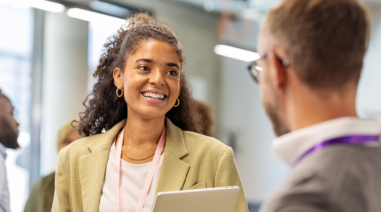 People talking at a conference