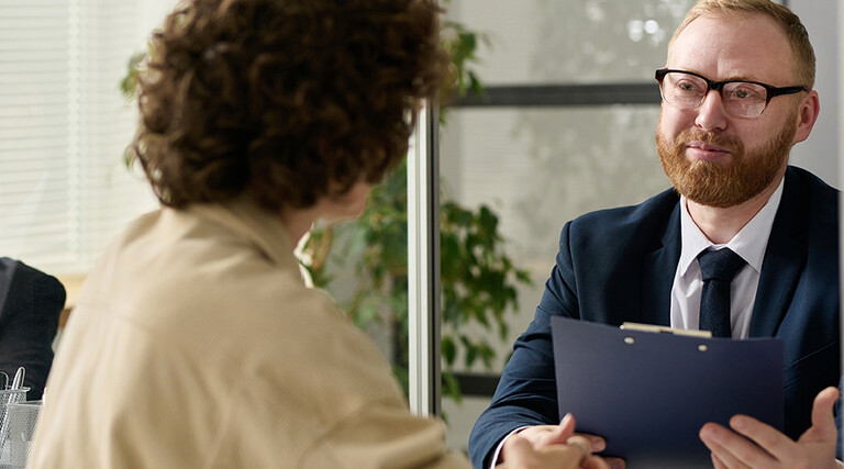 Consultant talking to a woman