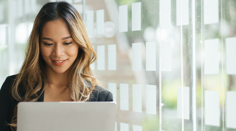 Person holding laptop