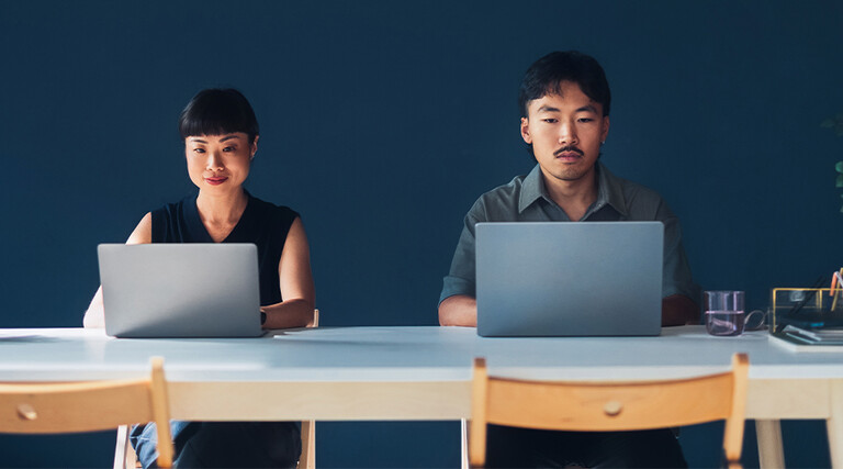Coworkers working side-by-side