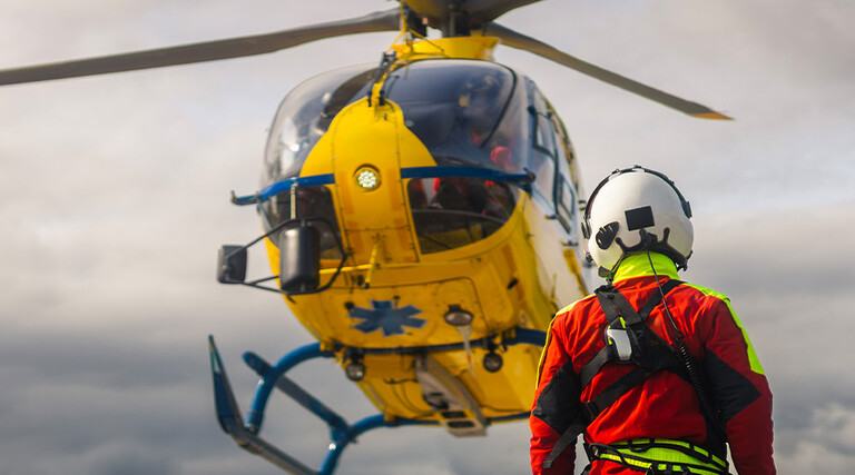First responder near helicopter