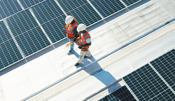 Solar panel team surveying