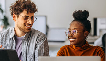 People working in the office together