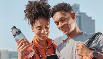 Couple looking at phone