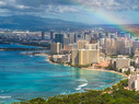 View of Honolulu harbor with a rainbow