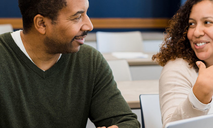 People working together on laptop