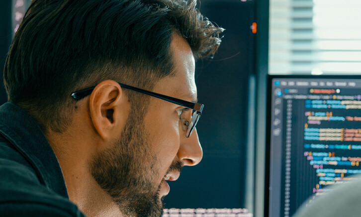 Person looking at code/data