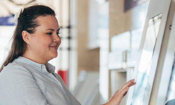 Person using interactive screen