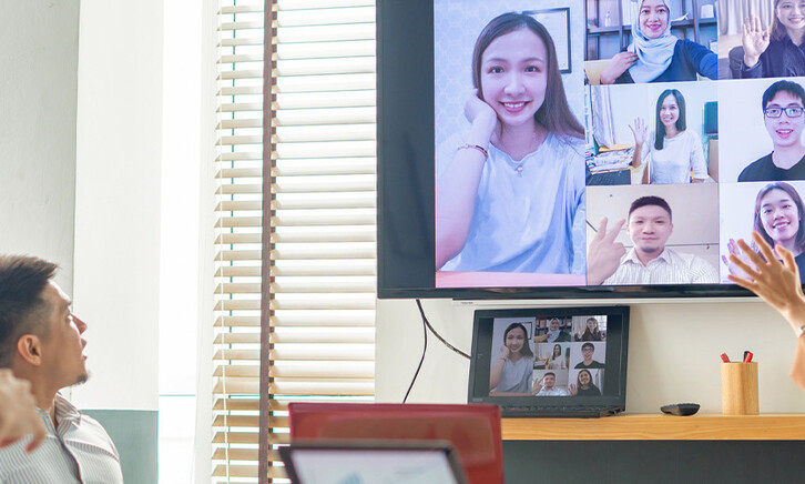 Coworkers collaborating virtually
