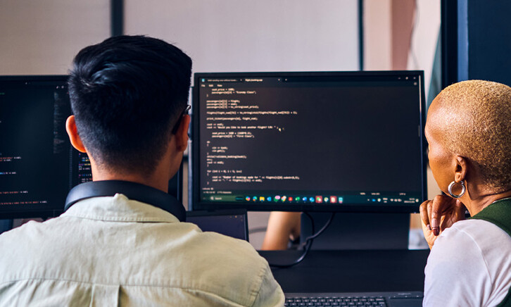 People coding in the office