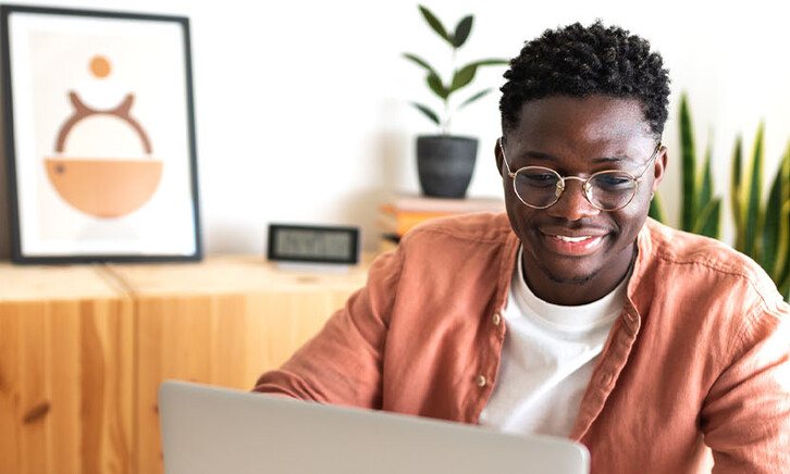 Person using laptop at home
