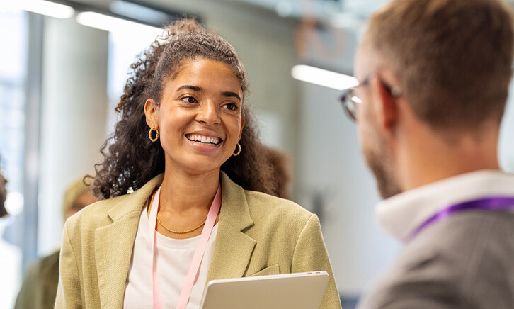 People talking at a conference