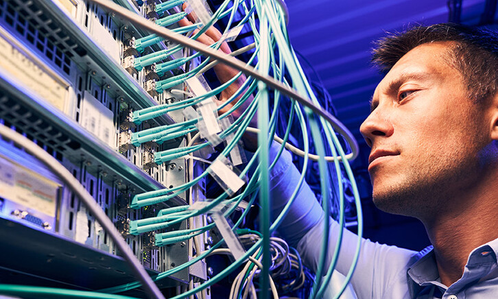 Engineer testing cables