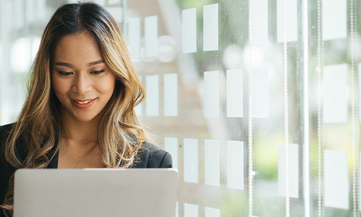 Person holding laptop