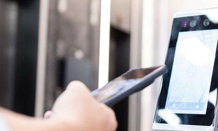 Person using phone to pay