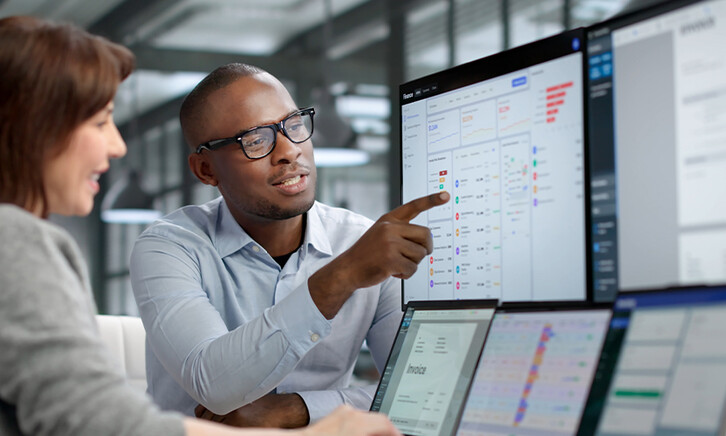 Coworkers reviewing data