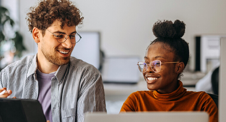 People working in the office together