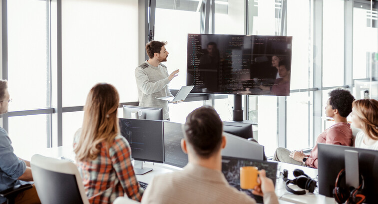 People learning coding on the job