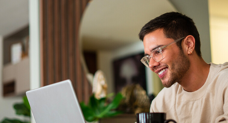 Citizen using laptop in home