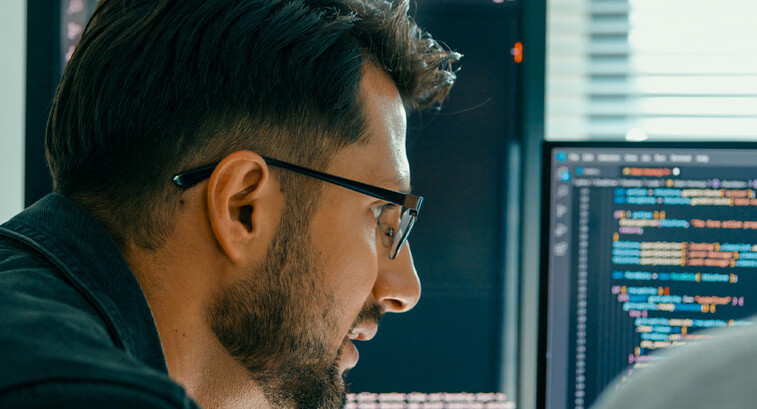 Person looking at code/data