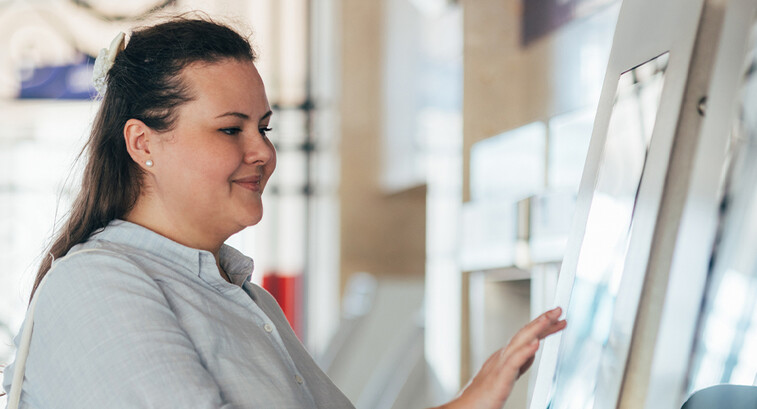 Person using interactive screen