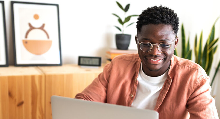 Person using laptop at home