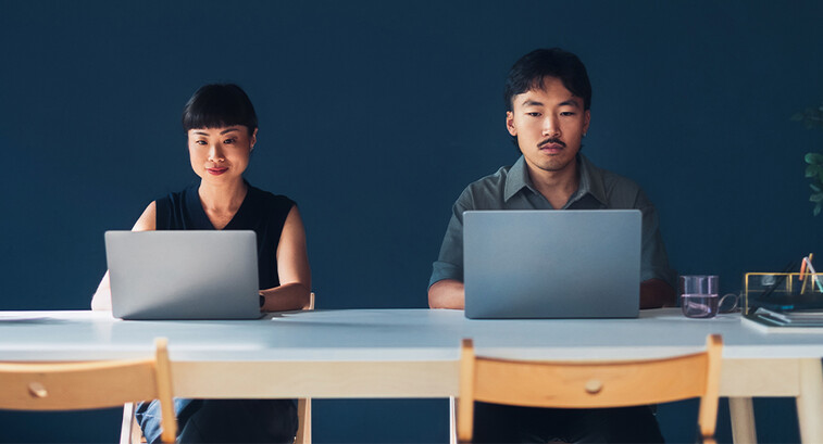 Coworkers working side-by-side