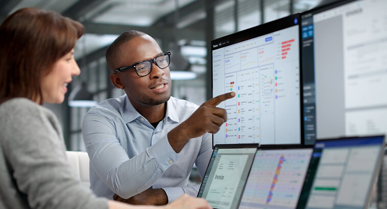 Coworkers reviewing data