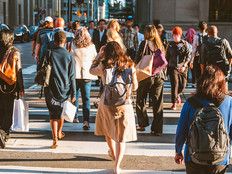A group of people crossing the street