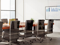 Outside View Of Empty Meeting Room With Table And Office Chairs