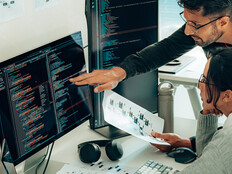 people collaborating on software development