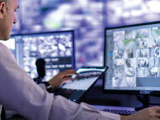 Man scanning through visual data 