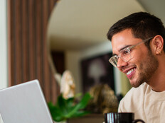 Citizen using laptop in home