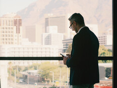 Person using phone in office